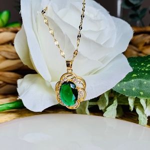 Spectacular Emerald Green Simulated Stone with Gold-Plated Stainless Steel.